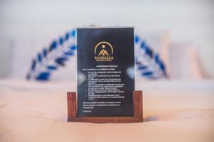 Een certificaat, prijs of ander document dat getoond wordt bij Valhalla Nimaima Glamping