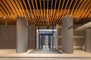 an entrance to an asopt sign in a building at Ascott Raffles City Chongqing in Chongqing