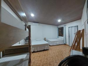 Postel nebo postele na pokoji v ubytování Hotel Carlota Tamarindo
