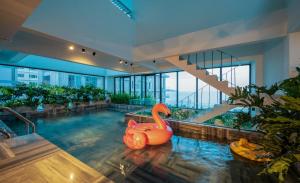 The swimming pool at or close to The Glomad Boutique Danang