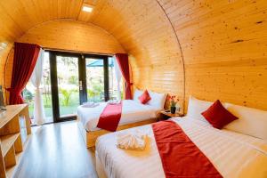 Postel nebo postele na pokoji v ubytování Moly Resort