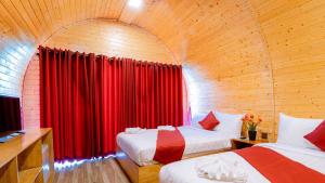 Postel nebo postele na pokoji v ubytování Moly Resort