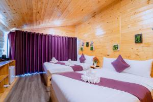 Postel nebo postele na pokoji v ubytování Moly Resort