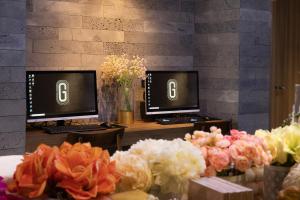 A television and/or entertainment centre at The Glomad Boutique Danang