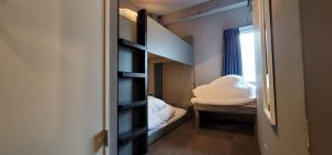 Postel nebo postele na pokoji v ubytování Rhodes Otsuka Hotel