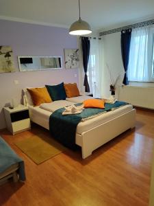 Postel nebo postele na pokoji v ubytování Apartments and Rooms PUNTA