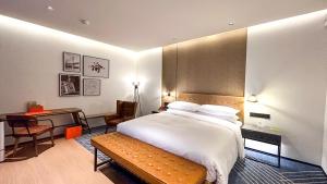 Postelja oz. postelje v sobi nastanitve Four Points by Sheraton Chongqing, Yongchuan