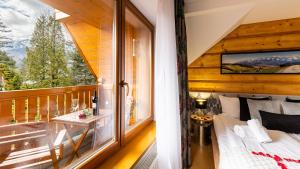 Posteľ alebo postele v izbe v ubytovaní Aparthotel Delta Zakopane