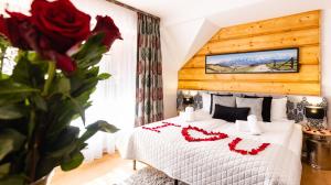 Posteľ alebo postele v izbe v ubytovaní Aparthotel Delta Zakopane