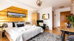 Posteľ alebo postele v izbe v ubytovaní Aparthotel Delta Zakopane