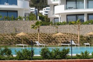Bazén v ubytovaní Flat Deluxe&Pool sea view Higueron West alebo v jeho blízkosti