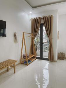 TV a/nebo společenská místnost v ubytování À Ơi Home - Venuestay