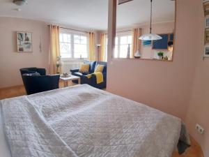 Postel nebo postele na pokoji v ubytování Ostseestrand