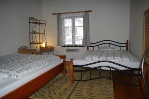 Postel nebo postele na pokoji v ubytování Chalupa Mlynářka