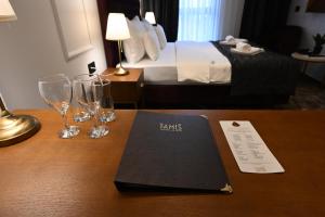 Ένα ή περισσότερα κρεβάτια σε δωμάτιο στο Hotel Tamiš & Spa