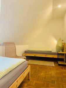 Habitación con 2 camas en una habitación en Landurlaub auf Hinners-Hoff, en Bendingbostel