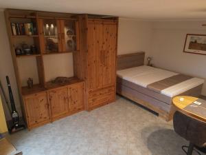 Postel nebo postele na pokoji v ubytování Ferienwohnung Pillasch 24306 Niede