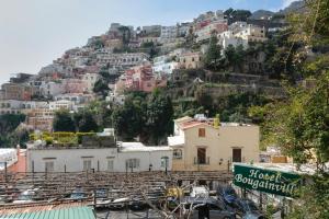 a town on a hill with houses on it at Hotel Bougainville in Positano