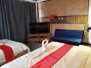 Letto o letti in una camera di Miley Lodging Restobar