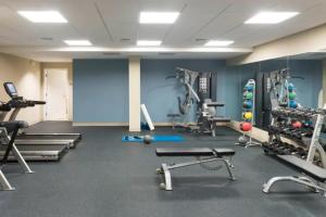 a gym with several treadmills and machines at Somerville 1br w wd in building nr Harvard MIT BOS-762 in Cambridge
