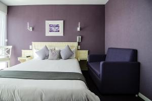 Postel nebo postele na pokoji v ubytování Hotel du Parc