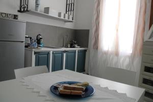 Kuchnia lub aneks kuchenny w obiekcie B&B Roseddu