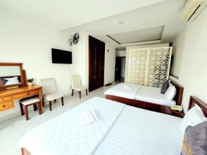 Postel nebo postele na pokoji v ubytování Nam Anh 2 Hotel