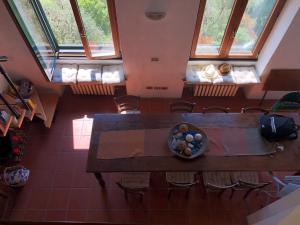 an overhead view of a table and chairs in a restaurant at Casa Madeleine in Zoagli