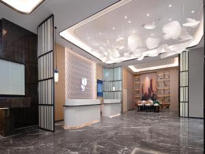 Vstupní hala nebo recepce v ubytování Country Inn & Suites by Radisson - Taishan East Branch