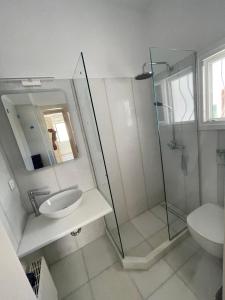 Koupelna v ubytování Cozy house in Naousa