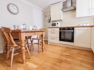 Køkken eller tekøkken på Sea Beach Cottage