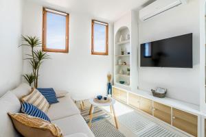 Televízia a/alebo spoločenská miestnosť v ubytovaní Casa Belvedere - duplex atypique avec vue féerique & parking souterrain
