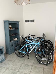 a group of bikes parked in a room at B&B Roseddu in Bitti