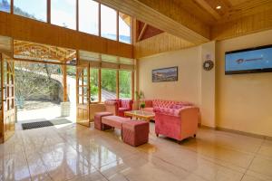 Posezení v ubytování Clarks Inn Suites, Manali