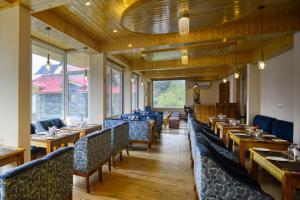 Posezení v ubytování Clarks Inn Suites, Manali