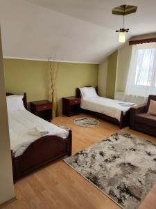 Postel nebo postele na pokoji v ubytování Guesthouse Bimbli