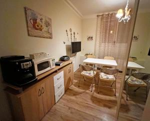 Kuchyňa alebo kuchynka v ubytovaní Jurincom apartments
