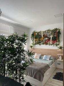 Postel nebo postele na pokoji v ubytování CASA MAUI + 6 fotografií