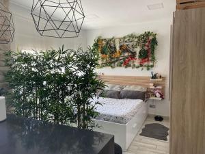 Postel nebo postele na pokoji v ubytování CASA MAUI