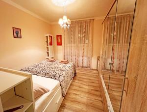 Posteľ alebo postele v izbe v ubytovaní Jurincom apartments
