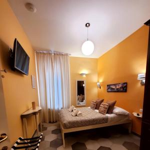 Säng eller sängar i ett rum på Residenza FillAnfi