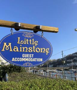 a sign for the lighthouse anchorage guest accommodation at Little Mainstone Guest House in Looe