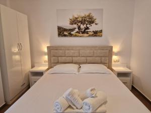Postel nebo postele na pokoji v ubytování Hotel Queen Margaret Seaside