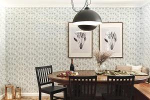 a dining room with a table and chairs at The Stonehouse Nagambie in Nagambie
