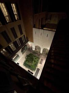 an aerial view of a courtyard in a building at [GALLERIA DUOMO] Luxury Design Apartment in Brescia