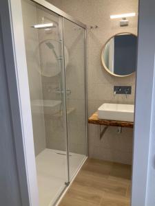 Koupelna v ubytování Atico Atlantico con Aparcamiento privado