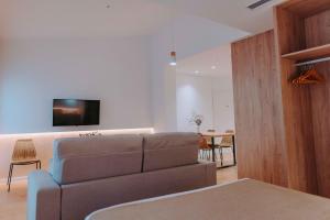 Apartamentos Santa Isabel的电视和/或娱乐中心