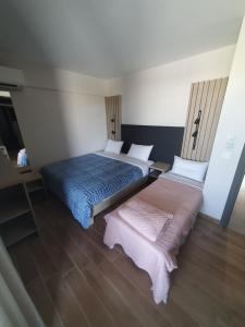 Ein Bett oder Betten in einem Zimmer der Unterkunft EUPHORIA ''Staying in Pleasure''