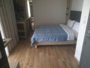 Ein Bett oder Betten in einem Zimmer der Unterkunft EUPHORIA ''Staying in Pleasure''