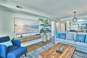 a living room with a couch and a table at Direct Ocean Front 3BR 3BA Beach Front in Myrtle Beach